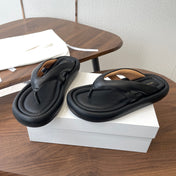 THE ROW 26S PUFFED THONG SANDALS IN BLACK CALFSKIN