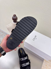 CELINE 25S FLAT SANDALS ARC DE TRIOMPHE IN BLACK CALFSKIN AND CANVAS