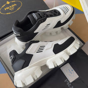 PRADA 26S CLOUDBUST THUNDER SNEAKERS 60MM IN WHITE AND BLACK MESH FABRIC AND TPU
