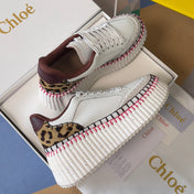 CHLOÉ 26S WEDGE SNEAKERS 70 MM IN WHITE CALFSKIN AND LEOPARD PRINT PONY HAIR