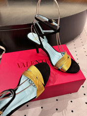 VLTN HIGH SANDAL 25S 60 MM IN BLACK SUEDE AND GOLD CALFSKIN