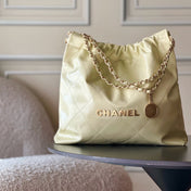 CHANEL 26S 22 BAG 42 IN PASTEL YELLOW QUILTED SHINY CALFSKIN