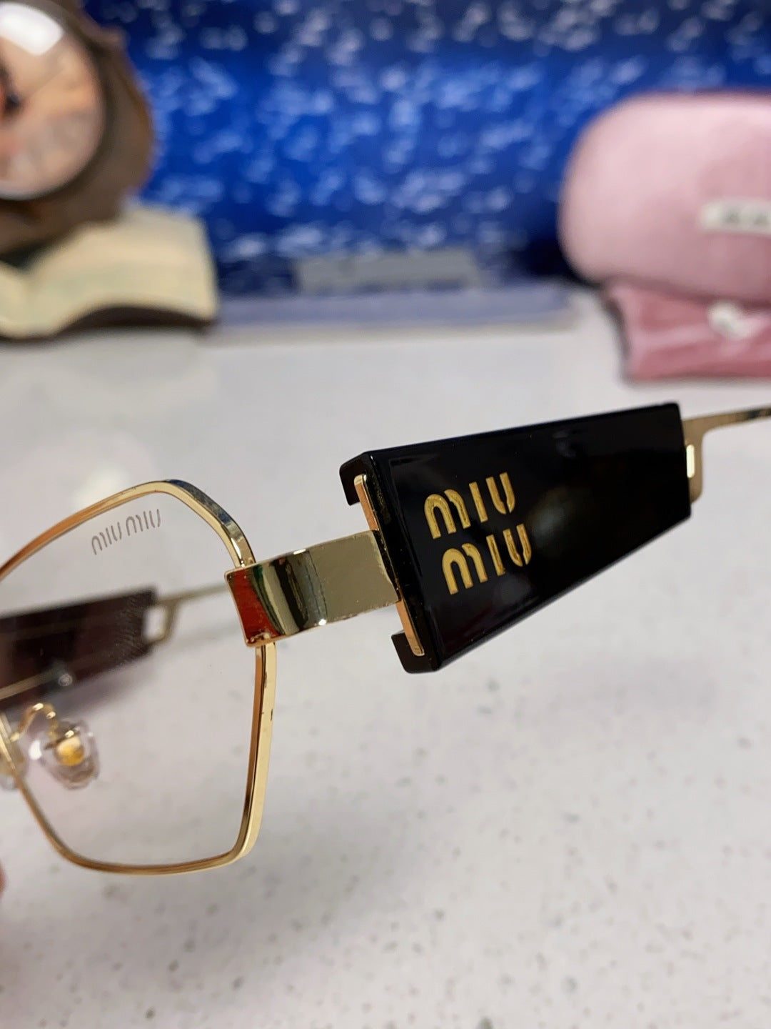MIUMIU 26S SQUARE FRAME IN METAL 443520