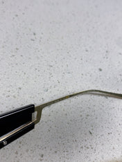 MIUMIU 26S SQUARE FRAME IN METAL 443520