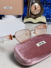 MIUMIU 26S SQUARE FRAME IN METAL 443522