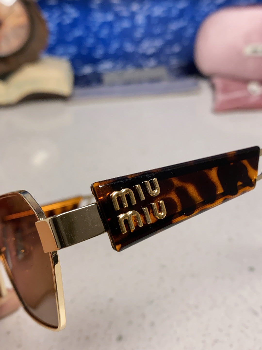 MIUMIU 26S SQUARE FRAME IN METAL 443523