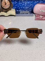 MIUMIU 26S SQUARE FRAME IN METAL 443523
