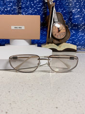 MIUMIU 26S RECTANGULAR FRAME IN METAL 426396