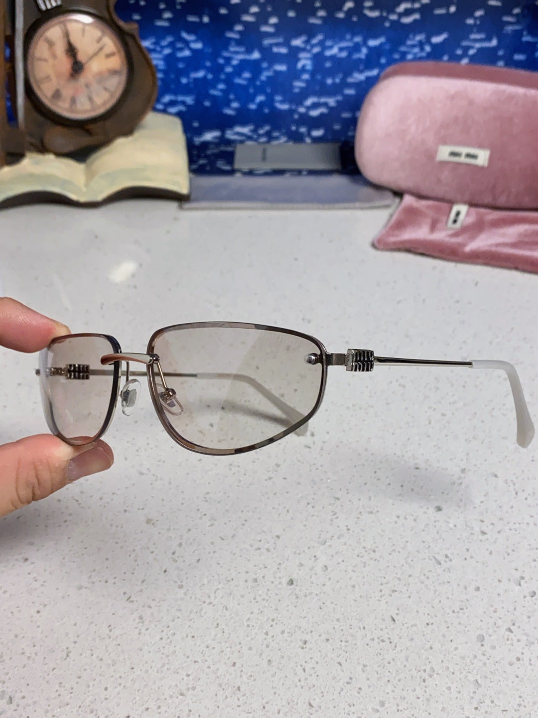 MIUMIU 26S RECTANGULAR FRAME IN METAL 426396