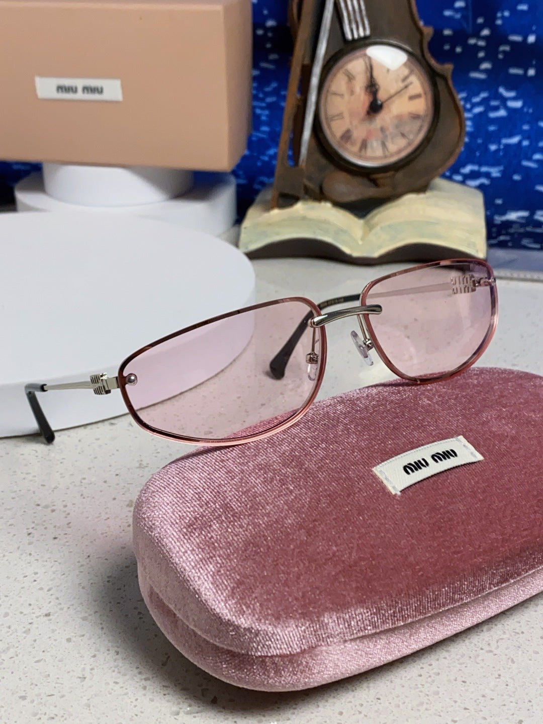 MIUMIU 26S RECTANGULAR FRAME IN METAL 426397