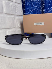 MIUMIU 26S RECTANGULAR FRAME IN METAL 426399