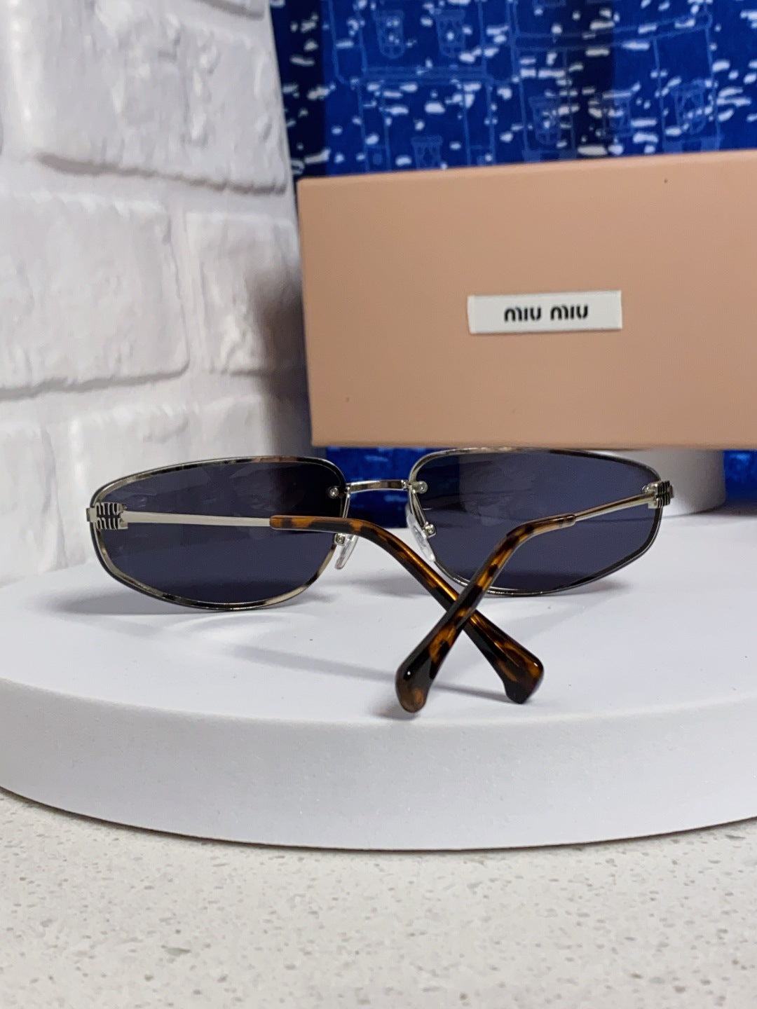 MIUMIU 26S RECTANGULAR FRAME IN METAL 426399