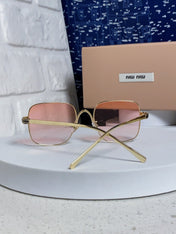 MIUMIU 26S SQUARE GEOMETRIC FRAME IN METAL 445239