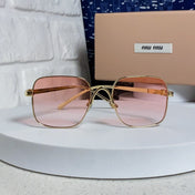 MIUMIU 26S SQUARE GEOMETRIC FRAME IN METAL 445239