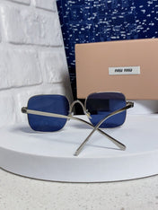 MIUMIU 26S SQUARE GEOMETRIC FRAME IN METAL 445240