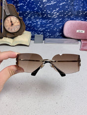 MIUMIU 26S SHIELD FRAME IN METAL 436118