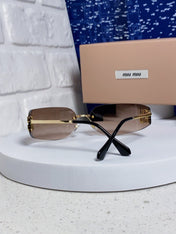 MIUMIU 26S SHIELD FRAME IN METAL 436118