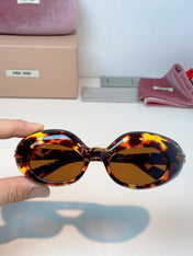 MIUMIU 26S BUTTERFLY FRAME IN ACETATE 424490