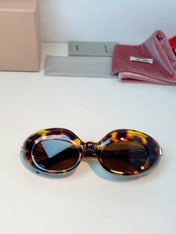 MIUMIU 26S BUTTERFLY FRAME IN ACETATE 424490
