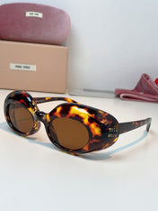 MIUMIU 26S BUTTERFLY FRAME IN ACETATE 424490