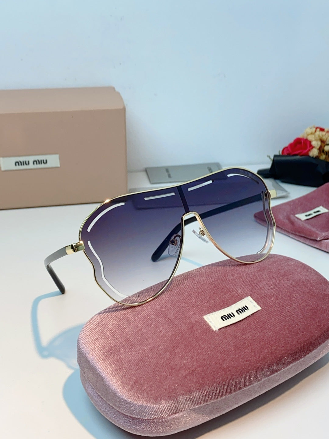MIUMIU 26S SHIELD FRAME IN METAL 424497
