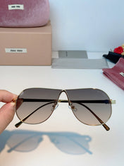 MIUMIU 26S OVAL FRAMEAVIATOR FRAME IN METAL 424522