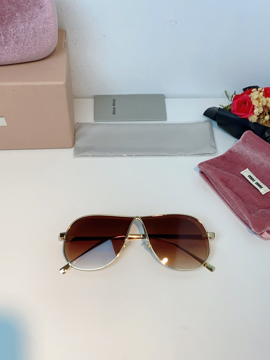 MIUMIU 26S OVAL FRAMEAVIATOR FRAME IN METAL 424523