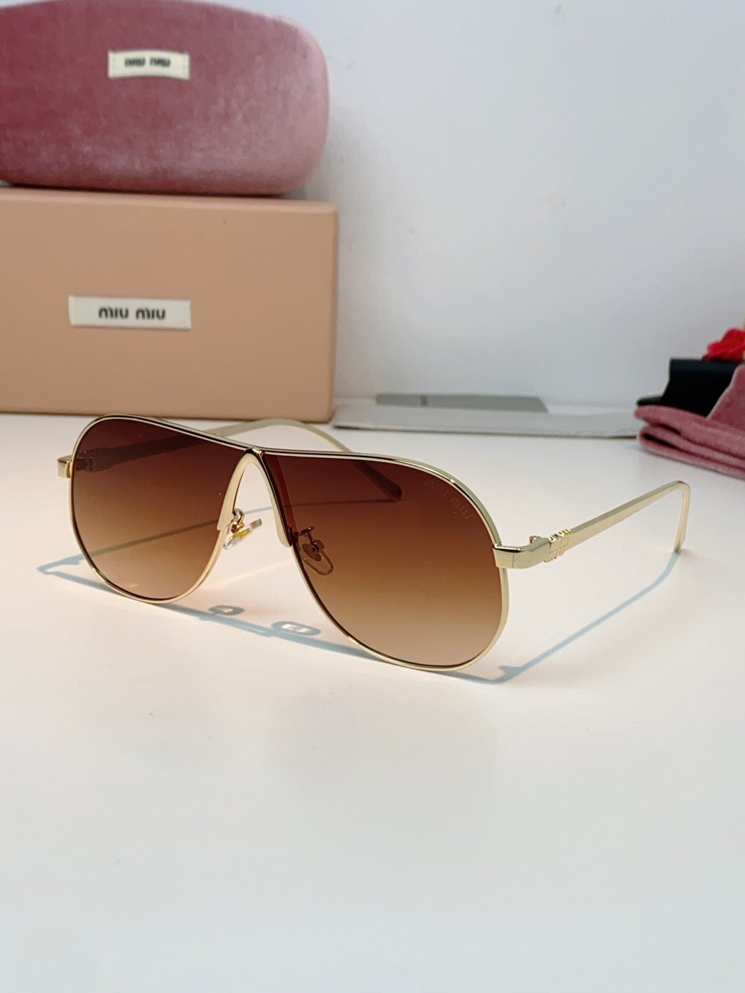 MIUMIU 26S OVAL FRAMEAVIATOR FRAME IN METAL 424523