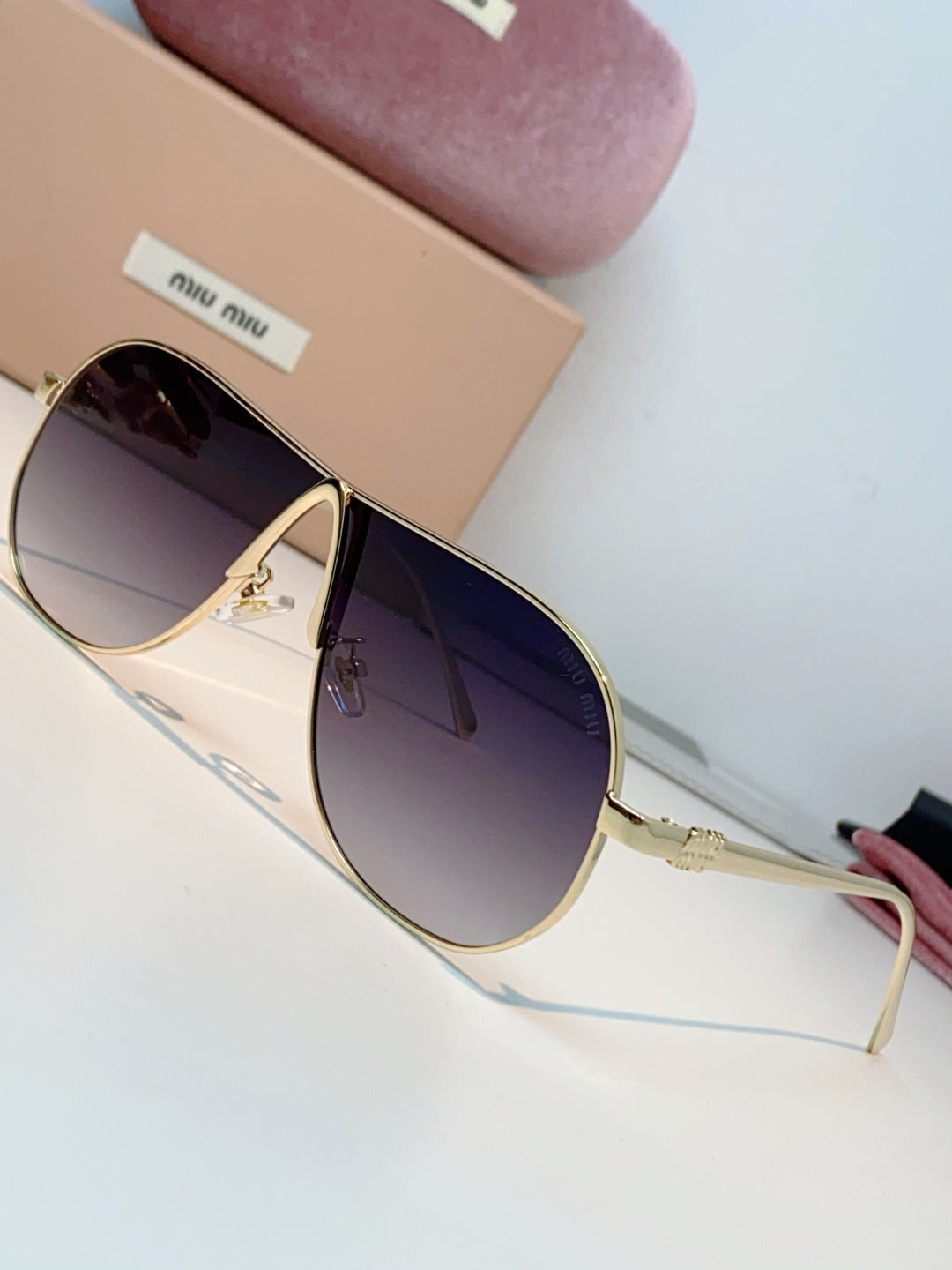 MIUMIU 26S OVAL FRAMEAVIATOR FRAME IN METAL 424524
