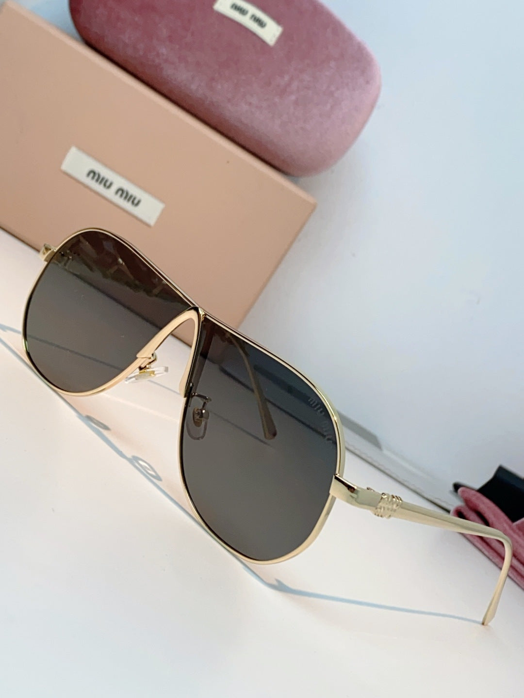 MIUMIU 26S OVAL FRAMEAVIATOR FRAME IN METAL 424525