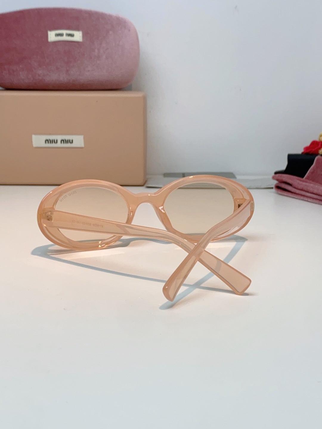 MIUMIU 26S OVAL FRAME IN ACETATE 424527