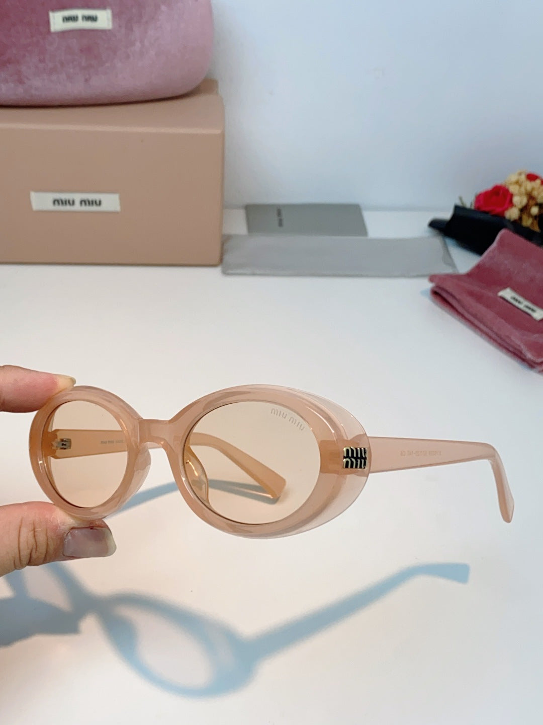 MIUMIU 26S OVAL FRAME IN ACETATE 424527