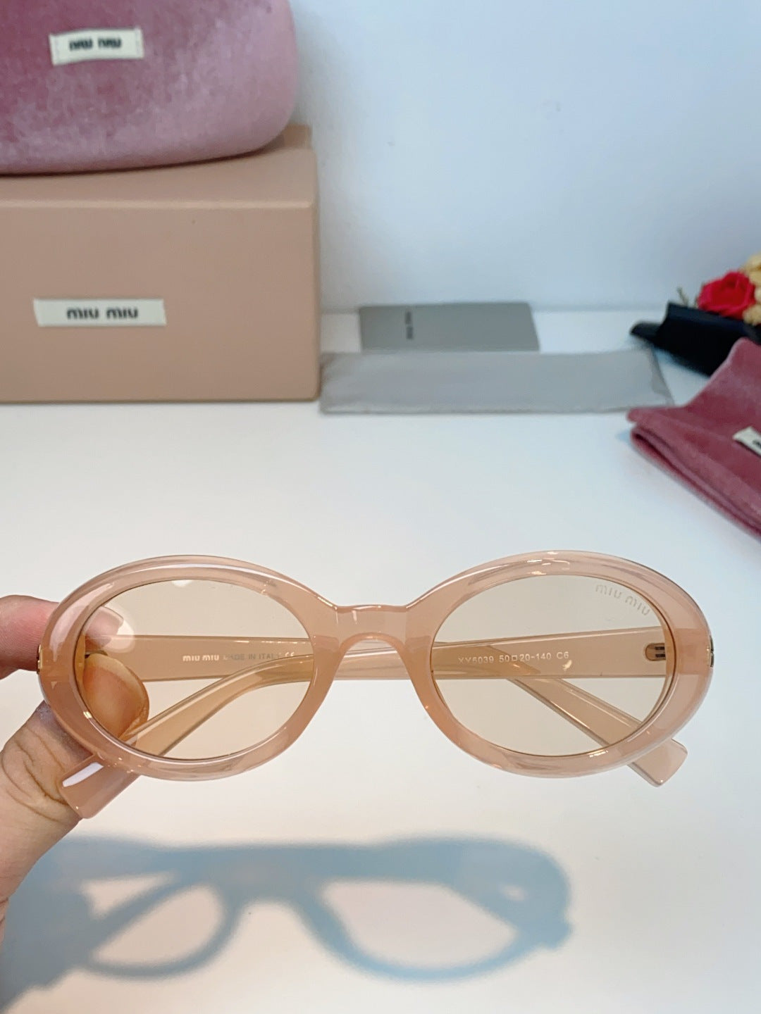MIUMIU 26S OVAL FRAME IN ACETATE 424527