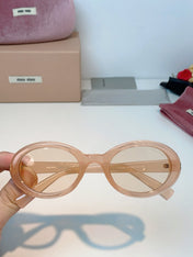 MIUMIU 26S OVAL FRAME IN ACETATE 424527