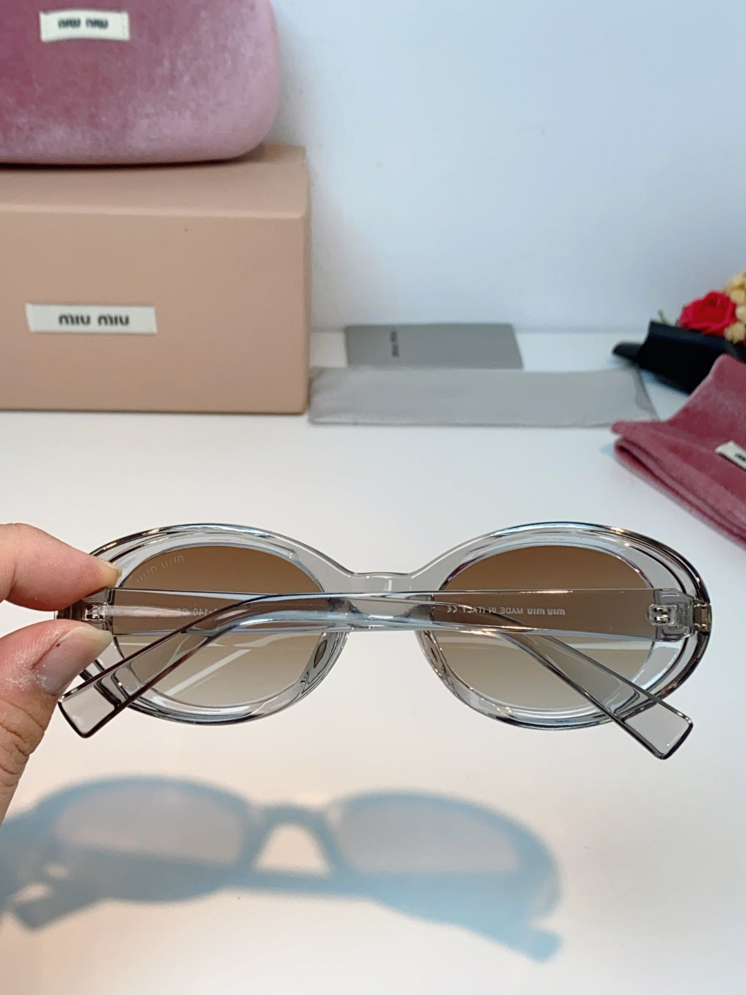 MIUMIU 26S OVAL FRAME IN ACETATE 424528