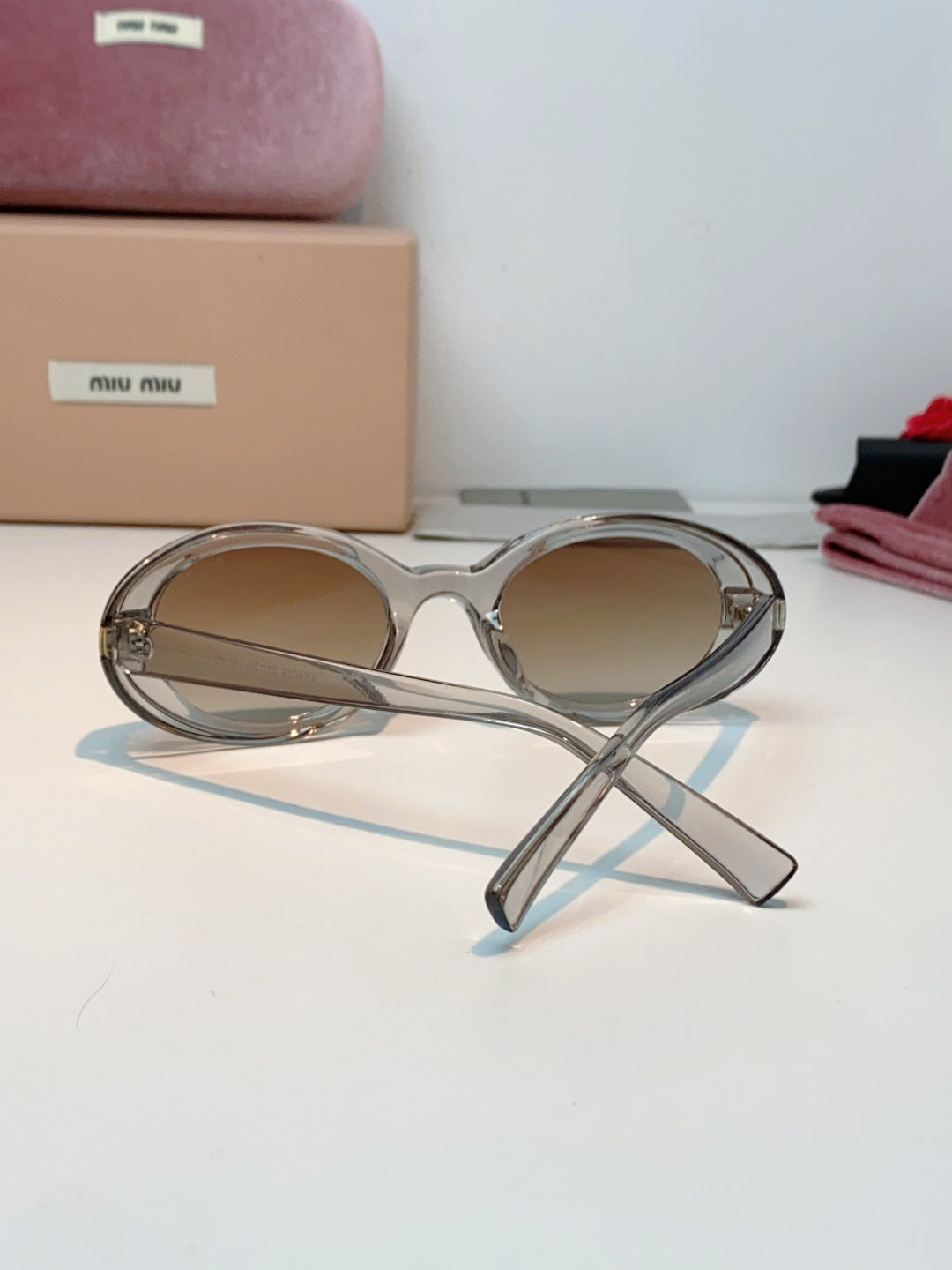 MIUMIU 26S OVAL FRAME IN ACETATE 424528