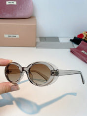 MIUMIU 26S OVAL FRAME IN ACETATE 424528
