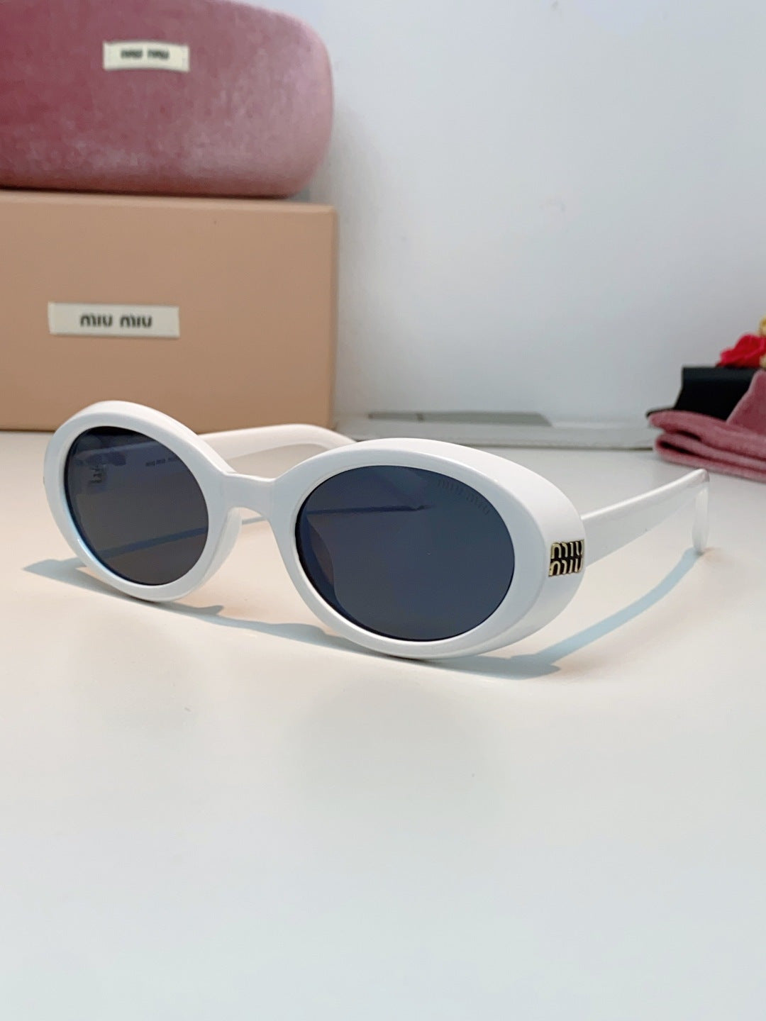 MIUMIU 26S OVAL FRAME IN ACETATE 424531