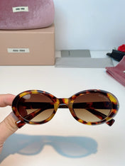 MIUMIU 26S OVAL FRAME IN ACETATE 424532