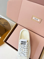 MIUMIU 26S SNEAKER MULES IN LIGHT YELLOW CANVAS