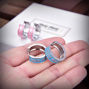 MIUMIU 26S LOGO HUGGIE HOOP EARRINGS IN LIGHT BLUE ENAMEL AND SILVER TONE METAL 622799
