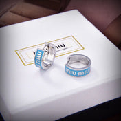MIUMIU 26S LOGO HUGGIE HOOP EARRINGS IN LIGHT BLUE ENAMEL AND SILVER TONE METAL 622799