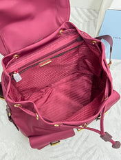 PRADA 25S RE-EDITION 1978 SMALL BACKPACK 32 IN BURGUNDY RE-NYLON