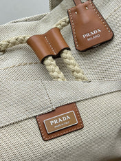 PRADA 25S DRAWSTRING BACKPACK 55 IN BEIGE CANVAS LINEN SILVER HARDWRE