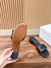 DIOR 26S LOW HEEL SLIDE SANDALS IN BLACK CALFSKIN PEARL GOLD BUCKLE