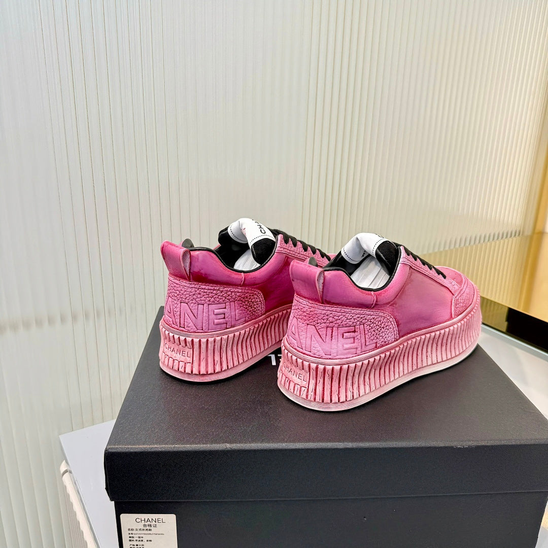 CHANEL 26S LOW-TOP SNEAKERS IN DARK PINK GRAFFITI PATTERN CALFSKIN
