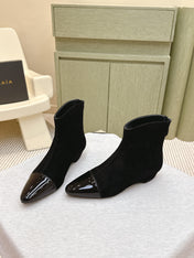 ALAIA 26S ANKLE BOOTS IN BLACK SUEDE AND GLOSSY CALFSKIN