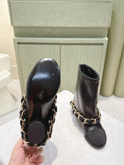 CHANEL 25S CALF-LENGTH BOOTS 45MM IN BLACK CALFSKIN GOLD HARDWARE