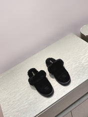CHANEL 25S FUR-LINED MULES IN BLACK SUEDE