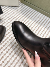 CHANEL 25S MID-CALF BOOTS IN BLACK CALFSKIN